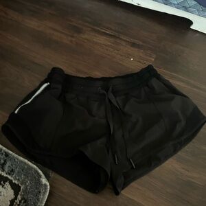 Black Lululemon drawstring hotty hot shorts size 8 Reg